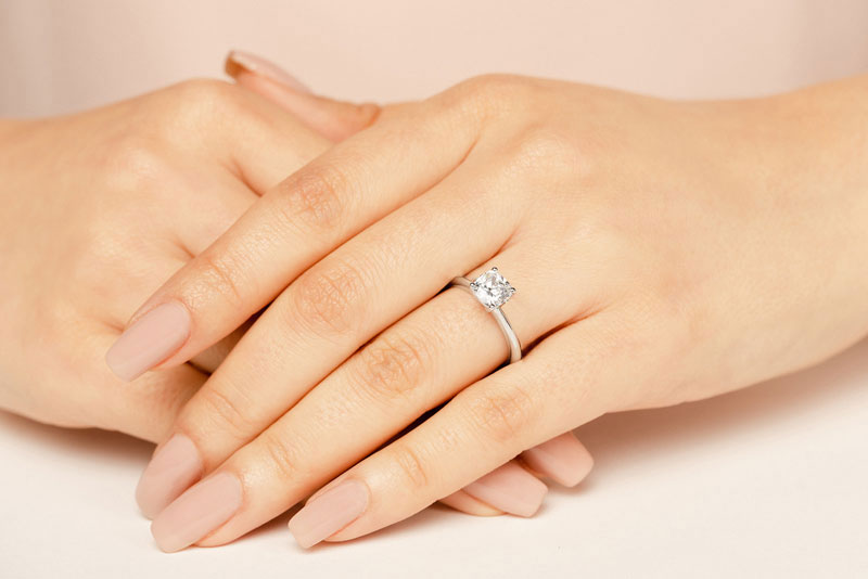 Captivating Cushion Cut Solitaire Engagement Ring