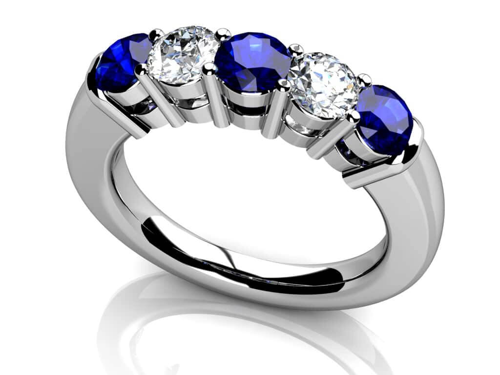 Prong Set Gemstone And Diamond Ring